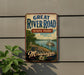 A vintage-style sign for Great River Road State Park in Mississippi, featuring a scenic illustration of a river, trees, and a steamboat.