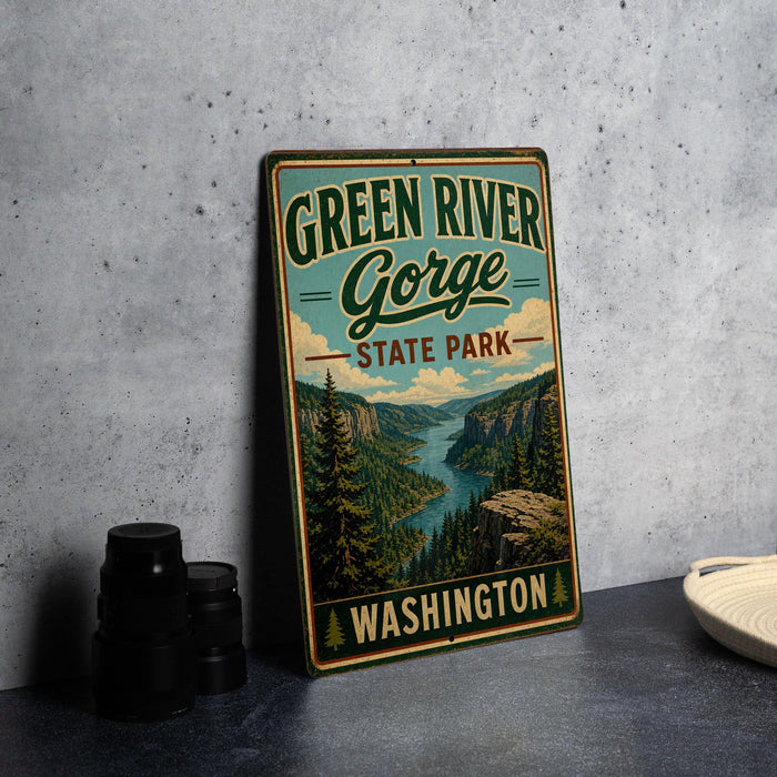 A vintage-style sign for Green River Gorge State Park in Washington, featuring a scenic mountain landscape.