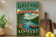 A vintage-style sign for Greenbo Lake State Resort Park in Kentucky, featuring a scenic image of a lake surrounded by trees and mountains.