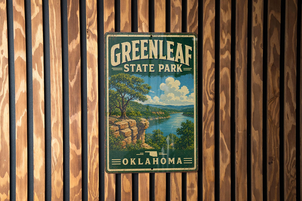 A vintage-style metal sign for Greenleaf State Park in Oklahoma, featuring a scenic landscape with a river, cliffs, and trees.