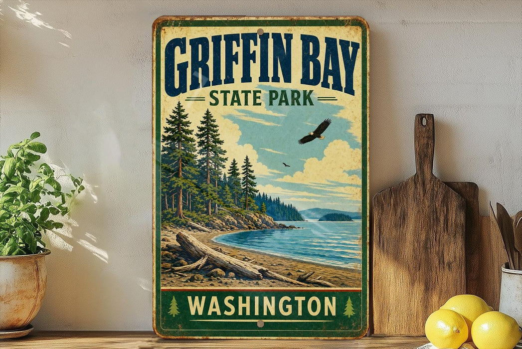 A vintage-style metal sign for Griffin Bay State Park in Washington, featuring a scenic landscape with pine trees, a beach, and a bird in flight.