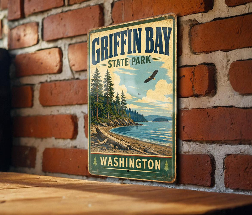 A vintage metal sign for Griffin Bay State Park in Washington, featuring a scenic landscape with pine trees, a beach, and a bird in flight.