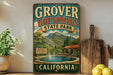 A vintage-style sign for Grover Hot Springs State Park in California, featuring a scenic illustration of the hot springs and mountains.