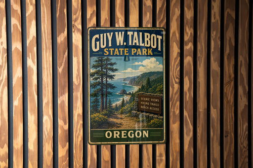 A vintage-style metal sign for Guy W. Talbot State Park in Oregon, featuring a scenic mountain landscape with a trail and a sign indicating hiking trails and beach access.