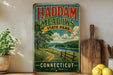 A vintage-style metal sign for Haddam Meadows State Park in Connecticut, featuring a scenic landscape with a river, trees, and a wooden fence.