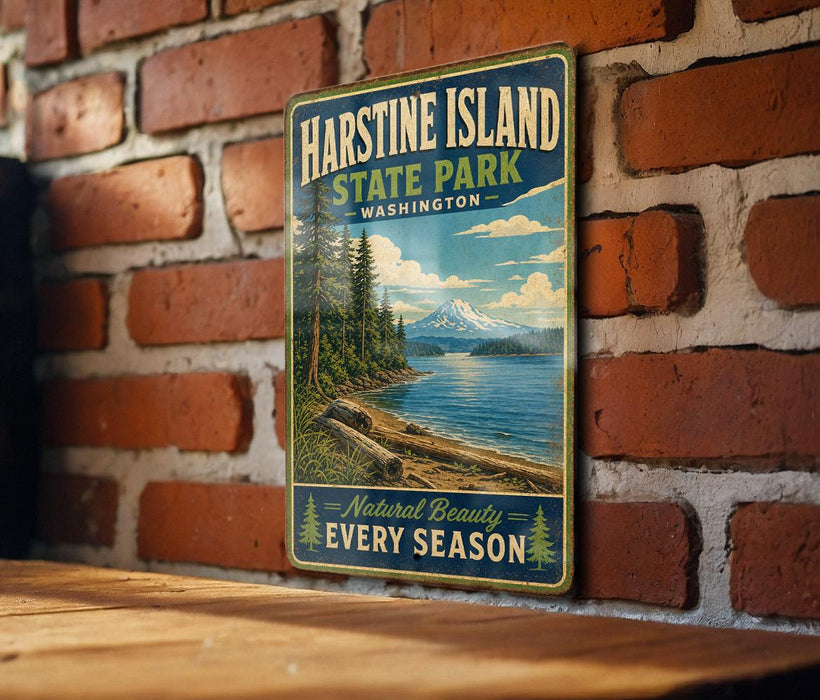 A vintage-style metal sign for Harstine Island State Park in Washington, featuring a scenic landscape with a mountain, trees, and a body of water.