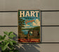 A vintage-style metal sign for Hart State Park in Georgia, featuring a scenic landscape with a lake and trees.