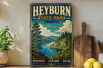 A vintage-style sign for Heyburn State Park, Idaho, featuring a scenic landscape with a river, mountains, and pine trees.