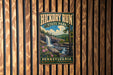 A vintage-style metal sign for Hickory Run State Park in Pennsylvania, featuring a waterfall and forest landscape.