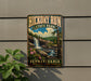 A vintage-style metal sign for Hickory Run State Park in Pennsylvania, featuring a scenic landscape with a waterfall and pine trees.