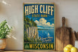 A vintage-style metal sign for High Cliff State Park in Wisconsin, featuring a scenic image of the park's cliffs and water.