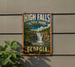 A vintage-style metal sign for High Falls State Park in Georgia, featuring a scenic waterfall and lush greenery.