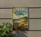A vintage-style metal sign for Hither Hills State Park, featuring a scenic beach and mountains in the background.