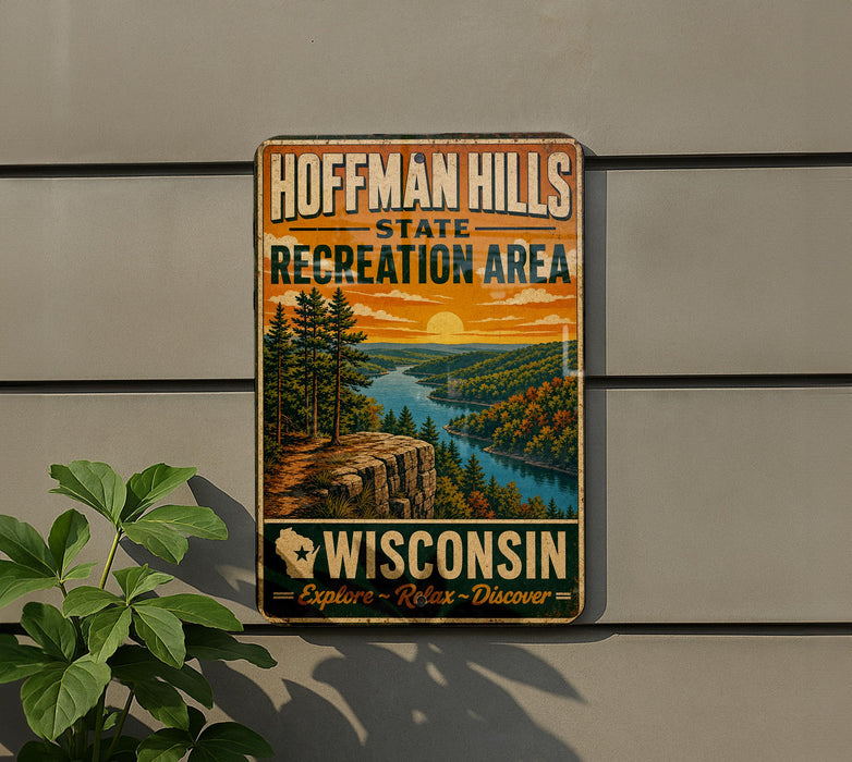 A vintage metal sign for Hoffman Hills State Recreation Area in Wisconsin, featuring a scenic landscape with a river, mountains, and trees.
