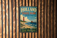 A vintage-style metal sign for Holland State Park in Michigan, featuring a lighthouse and beach scene.