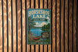 A vintage-style metal sign for Horseshoe Lake, Illinois, featuring a scenic image of the lake and surrounding nature.