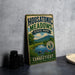 A vintage-style sign for Housatonic Meadows State Park in Connecticut, featuring a scenic landscape with a river and mountains.