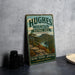 A vintage-style sign for the Hughes Mountain Natural Area in Missouri, featuring a scenic landscape with a river and mountains.