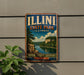 A vintage-style metal sign for Illinois State Park, featuring a scenic landscape with a river, cliffs, and trees.