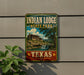 A vintage-style sign for Indian Lodge State Park in Texas, featuring a scenic illustration of a lodge and a waterfall.