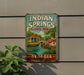 A vintage metal sign for Indian Springs State Park in Georgia, featuring a scenic illustration of a pond, a gazebo, and a bridge.