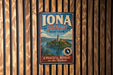 A vintage-style metal sign for Iona Island, New York, featuring a scenic image of the island and the Hudson River.