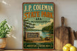 A vintage-style metal sign for J.P. Coleman State Park in Mississippi, featuring a scenic illustration of the park and its surroundings.