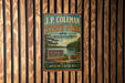 A vintage-style metal sign for J.P. Coleman State Park in Mississippi, featuring a scenic landscape with a lake and forest.