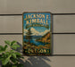 A vintage-style metal sign for the Jackson F. Kimball State Recreation Site in Oregon, featuring a scenic landscape with a mountain, lake, and pine trees.
