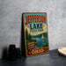 A vintage-style sign for Jefferson Lake State Park in Ohio, featuring a scenic illustration of the lake and surrounding landscape.