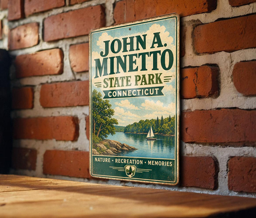 A vintage-style metal sign for John A. Minetto State Park in Connecticut, featuring a scenic landscape with a lake, trees, and a sailboat.