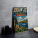 A vintage-style sign for Johnson Lake, Nebraska, advertising various recreational activities such as fishing, boating, camping, hiking, and relaxing.