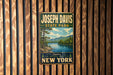 A vintage-style metal sign for Joseph Davis State Park in New York, featuring a scenic landscape with a lake and mountains.