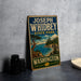 A vintage-style sign for Joseph Whidbey State Park in Washington, featuring a scenic landscape with a pine tree, a body of water, and mountains in the background.