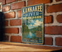 A vintage-style metal sign for Kankakee River State Park in Illinois, featuring a scenic illustration of the river and surrounding landscape.