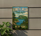 A vintage-style sign for Kenneth L. Wilson State Park in New York, featuring a scenic landscape with a lake and mountains.