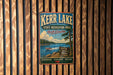 A vintage metal sign for Kerr Lake, North Carolina, featuring a scenic image of the lake and surrounding landscape.