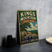 A vintage-style sign for Kings Mountain State Park, featuring a scenic illustration of a rocky landscape with a tree and mountains in the background.