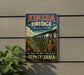 A vintage-style sign for Kinzua Bridge State Park in Pennsylvania, featuring a scenic image of the bridge and surrounding landscape.
