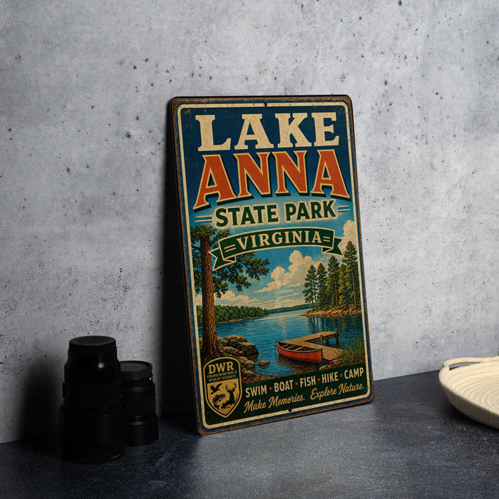 A vintage-style sign for Lake Anna State Park in Virginia, featuring a scenic illustration of a lake, trees, and a boat.