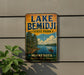 A vintage-style metal sign for Lake Bemidji State Park in Minnesota, featuring a scenic illustration of a lake, trees, and a person in a canoe.