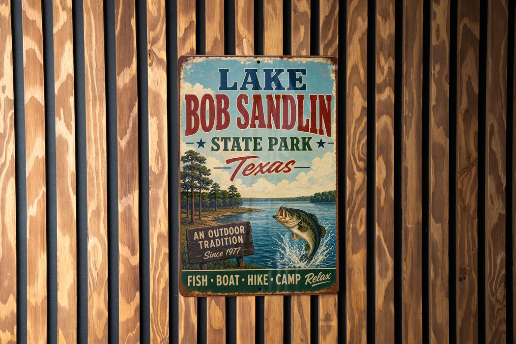 A vintage metal sign for Lake Bob Sandlin State Park in Texas, featuring a fishing scene and the text "An Outdoor Tradition Since 1977" and "FISH - BOAT - HIK - CAMP - Relax".