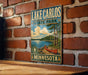 A vintage-style metal sign for Lake Carlos State Park in Minnesota, featuring a canoe and a scenic landscape.