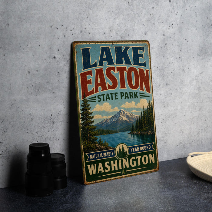 A vintage-style sign for Lake Easton State Park in Washington, featuring a scenic landscape with a mountain and lake.