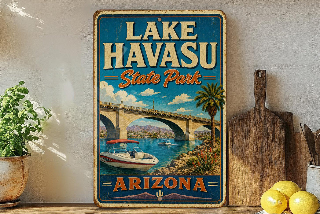 A vintage-style sign for Lake Havasu State Park in Arizona, featuring a scenic illustration of a boat on a lake with a bridge in the background.