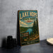 A vintage-style sign for Lake Hope State Park in Ohio, featuring a scenic landscape with a lake, forest, and mountains.