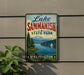 A vintage-style sign for Lake Sammish State Park in Washington, featuring a scenic landscape with a lake, mountains, and a sailboat.