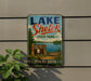 A vintage-style sign for Lake Shetek State Park in Minnesota, featuring a scenic illustration of the park's lake and surrounding landscape.
