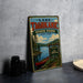 A vintage-style sign for Lake Taghkanic State Park in New York, featuring a scenic illustration of a lake, trees, and a canoe.