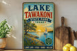 A vintage-style sign for Lake Tawakoni State Park in Texas, featuring a scenic illustration of a lake, trees, and a sailboat.